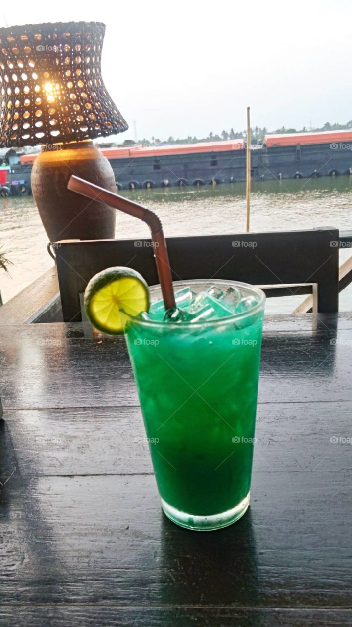 Green Lemon ice at river side cafe in bangkok.