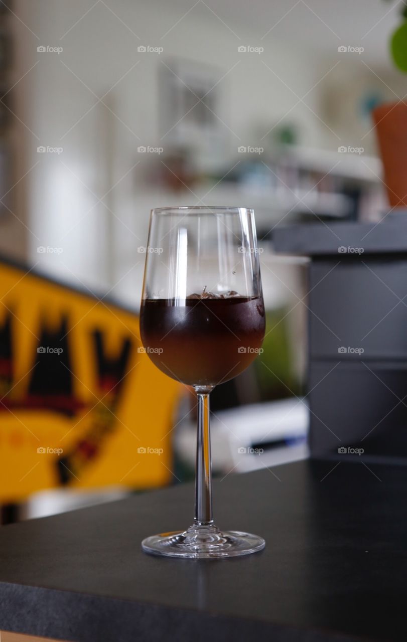 Cold brew ice coffee in wine glass