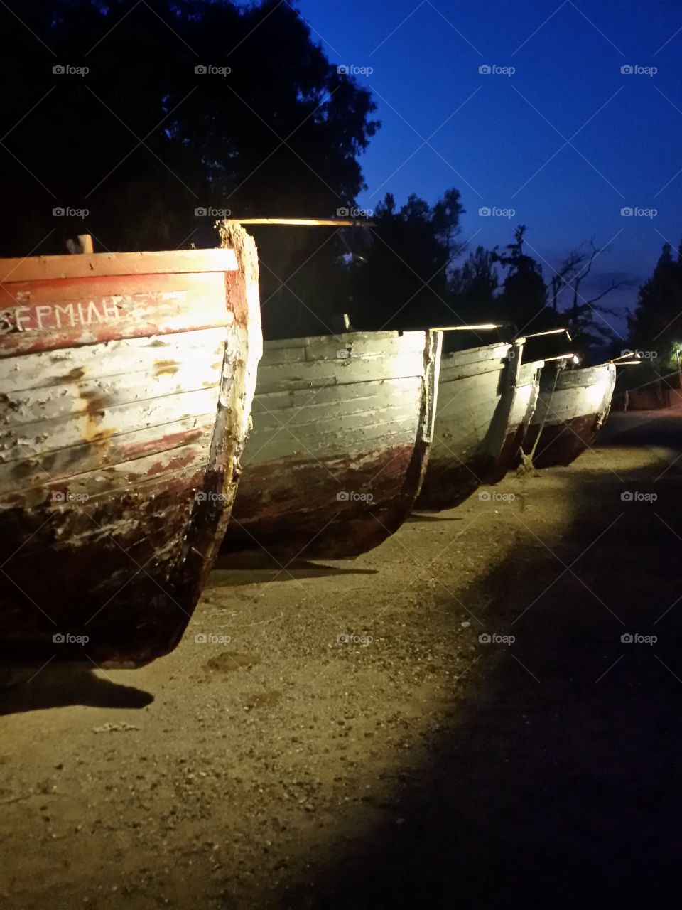 Old wooden boats on the coast. unusuable