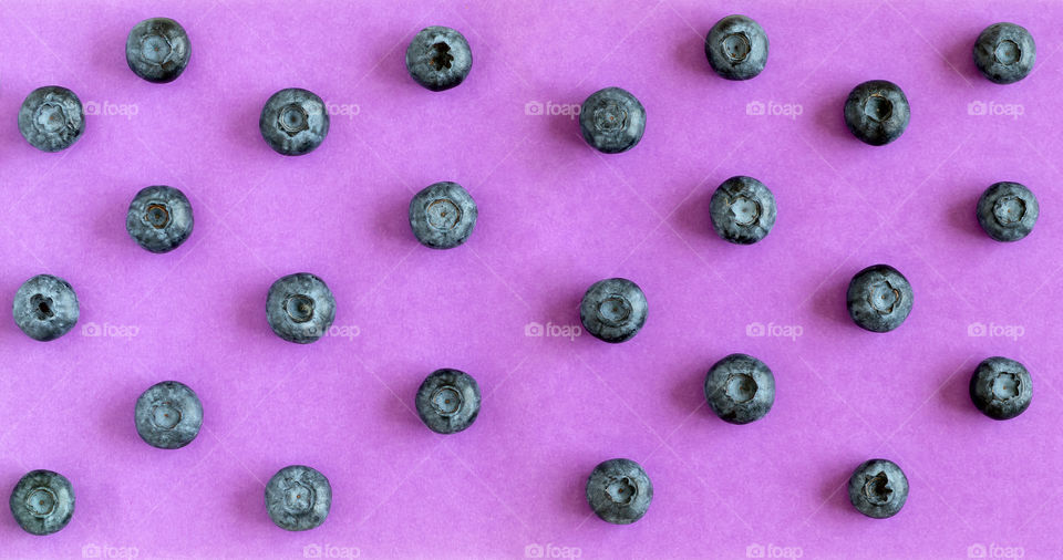Blueberries flatlay pattern. Healthy lifestyle concept.