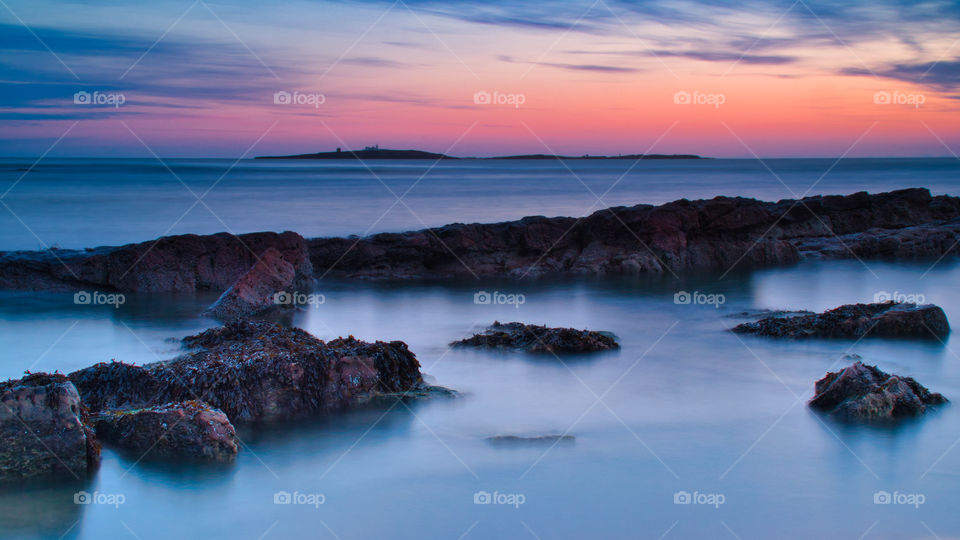 Farne Islands from Seahouses beach at dawn