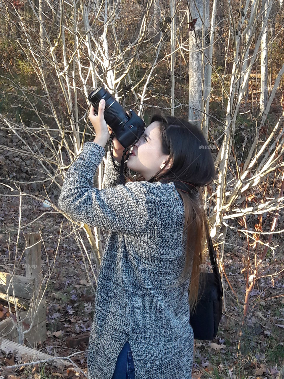 Female photographer clicking photograph