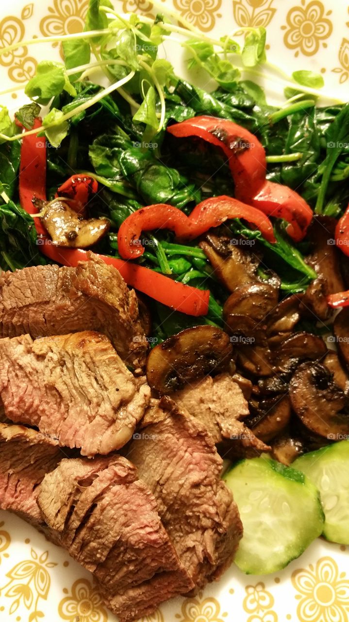 Steak, charred red bell pepper strips, sauteed mushrooms, lightly steamed spinach, sliced cucumber, with wild arugula and tender young pea shoots.