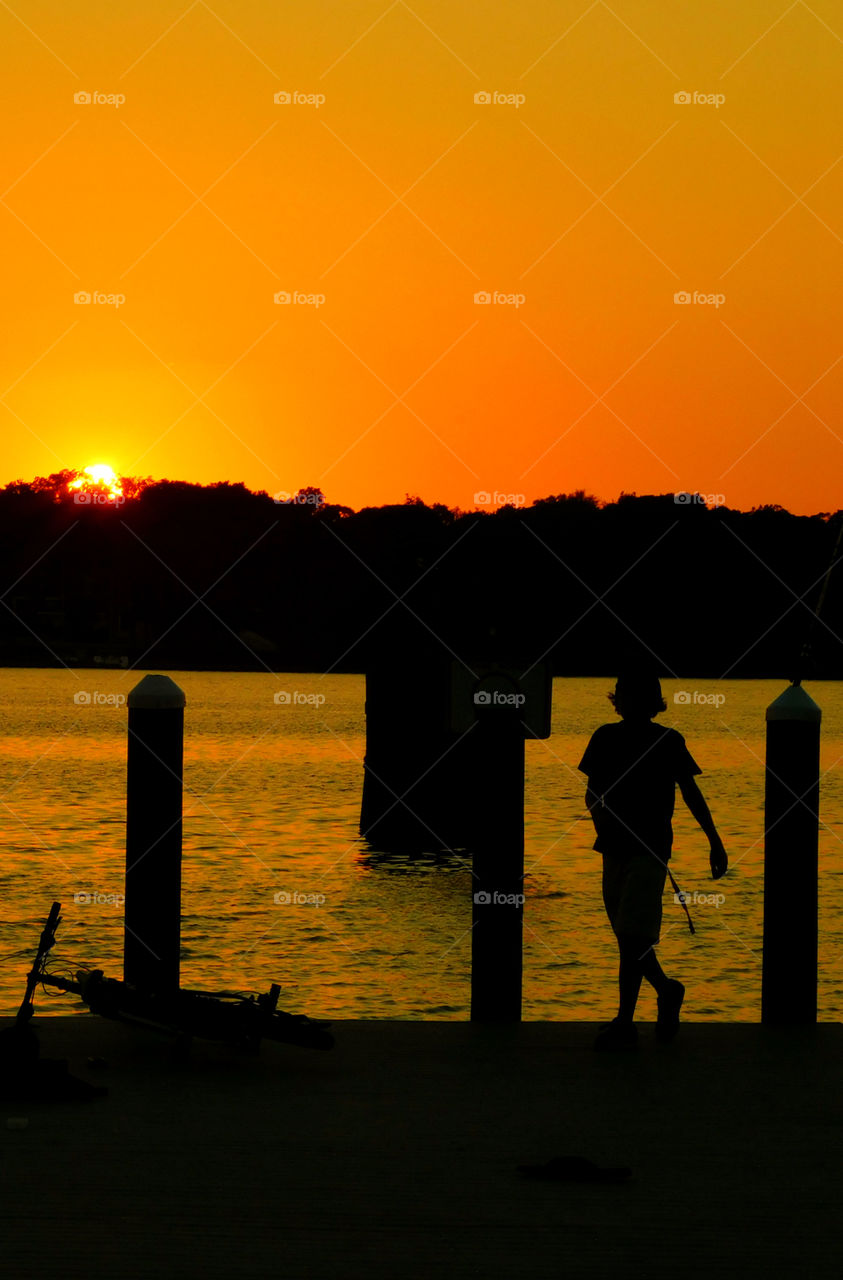 Incredible Sunsets! I am a Sunset enthusiast! The brilliant crimson, amber,tangerine, and blue hues of the sunsets sweep the sky and the surface of the waterways as the beautiful colors embrace the heavenly sky! Breathtaking!