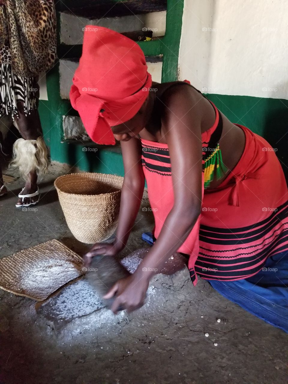 African woman preparing food