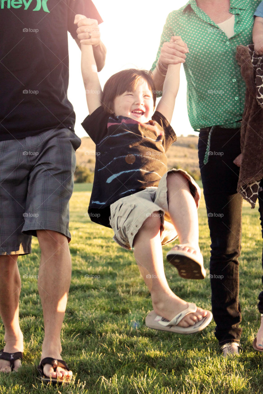 Happy child with mother and father