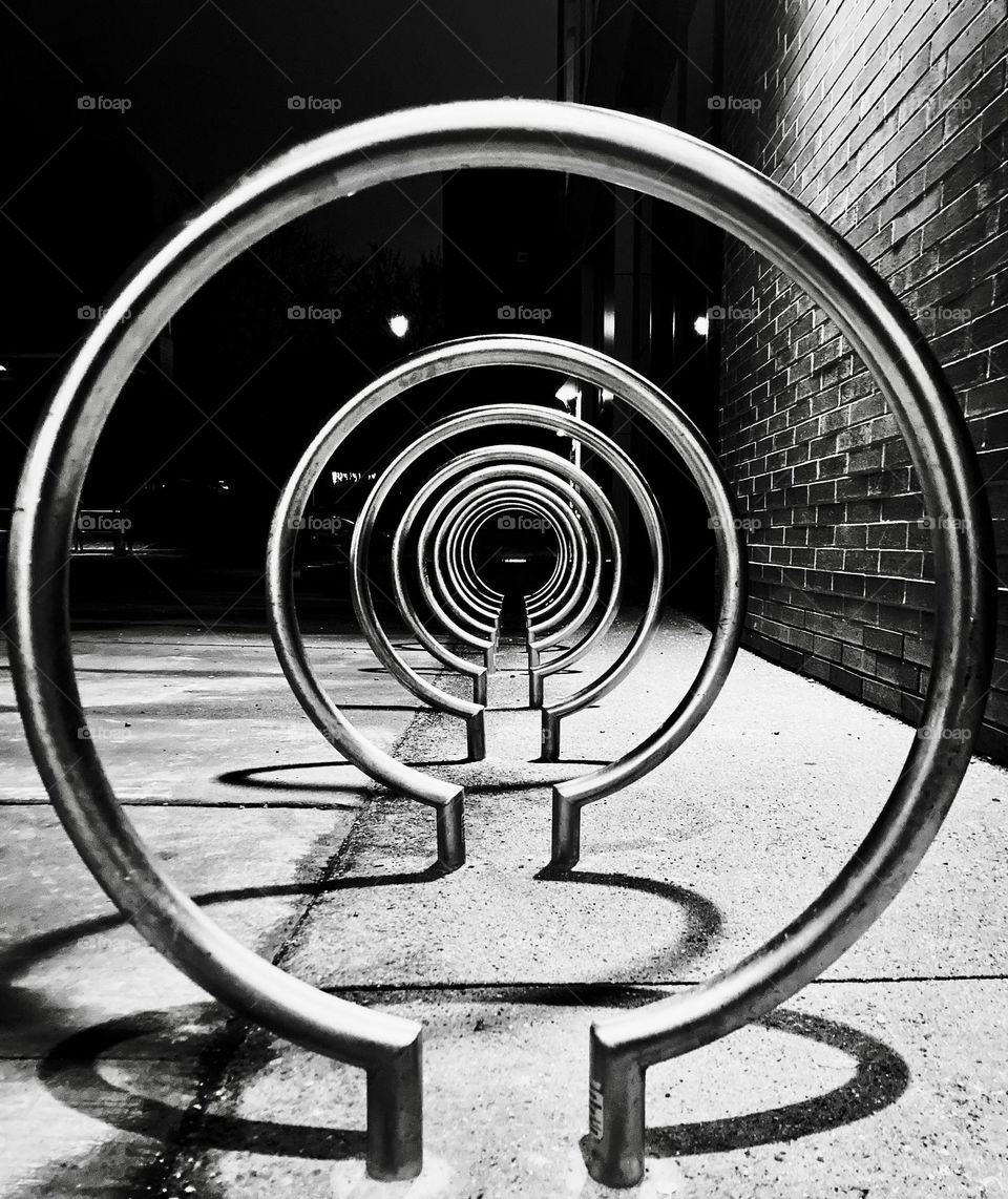 Black and white bike rack creates an interesting pattern.