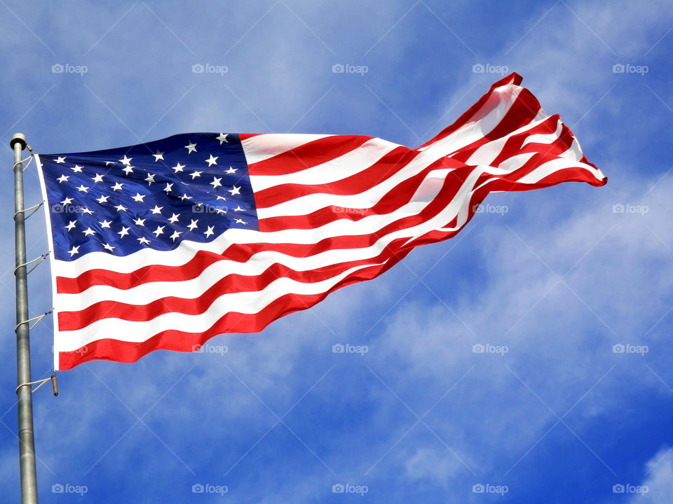 Flag of the United States of America blowing in the wind.