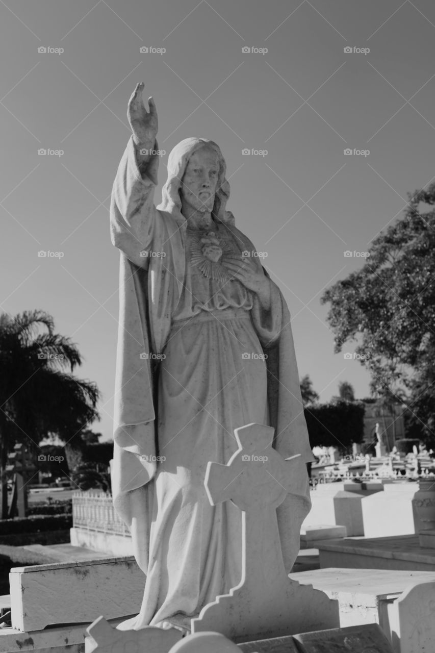 The Colon Cemetery, or more fully in the Spanish language Cementerio de Cristóbal Colón, was founded in 1876 in the Vedado neighbourhood of Havana, Cuba on top of Espada Cemetery. Named for Christopher Columbus, the 140 acre (57 ha) cemetery is noted for its many elaborately sculpted memorials. It is estimated that today the cemetery has more than 500 major mausoleums, chapels, and family vaults.
Colon Cemetery is one of the great historical cemeteries of the world, and is generally held to be the most important in Latin America in historical and architectural terms, second only to La Recoleta in Buenos Aires. Prior to the opening of the Colon Cemetery, Havana's dead were laid to rest in the crypts of local church catacombs and then, beginning in 1806, at Havana's newly opened Espada Cemetery. When locals realized there would be a need for a larger space for their community’s dead (due to an 1868 cholera outbreak), planning then began for the Colon Cemetery.