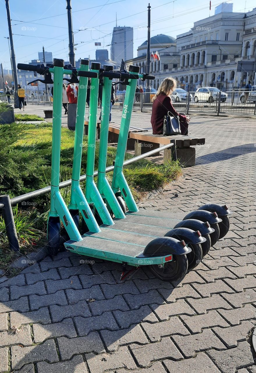 cityscape  with electric scooters