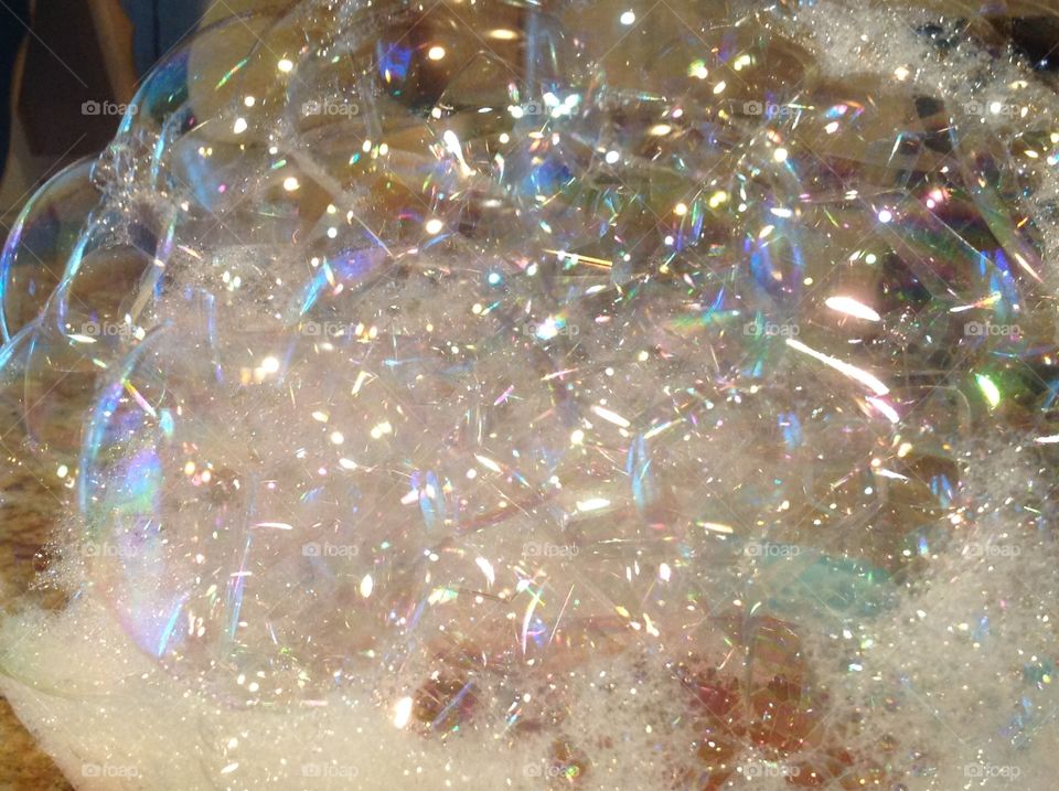 Bubbles flowing out of a bowl.