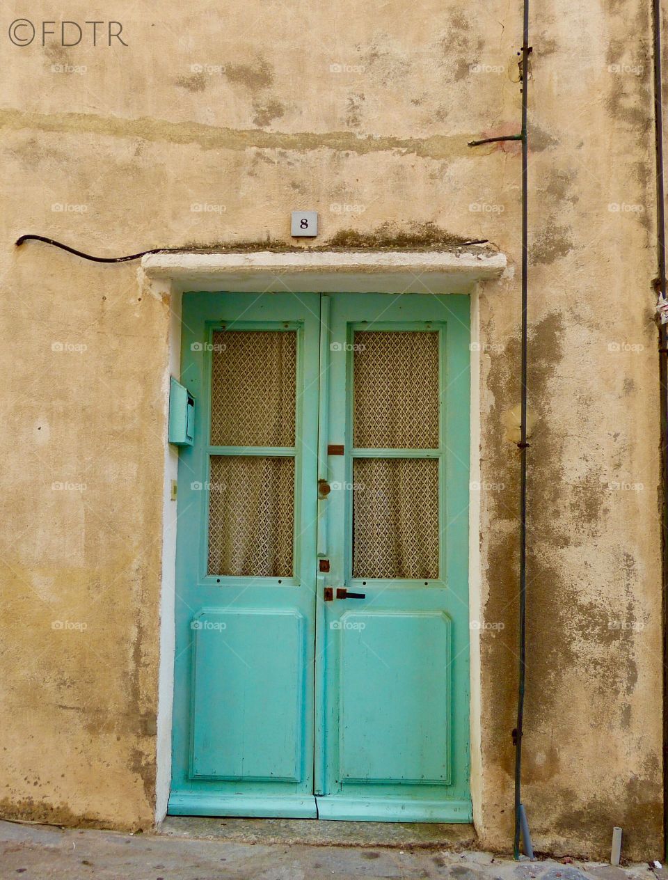 Green door at Calvi