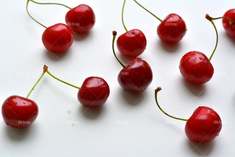 red cherry summer food white background