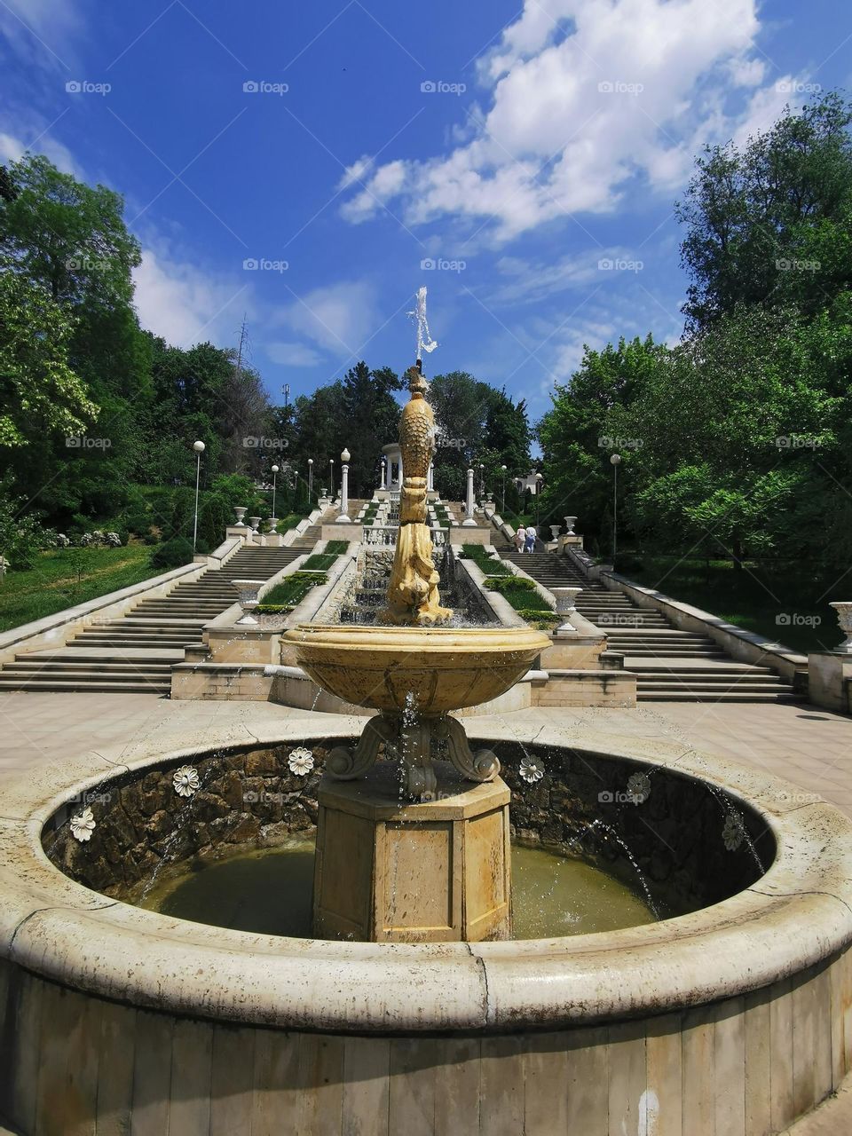 Urban life: waterfall and well