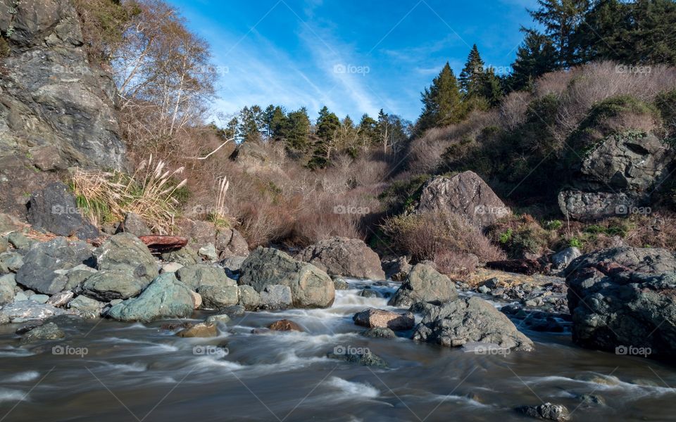 Stream flowing through rocks