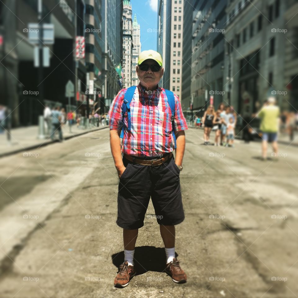 Portrait of a man standing on street