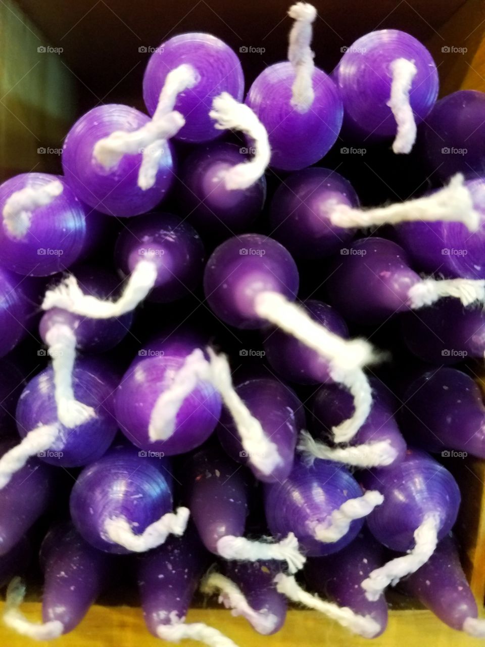 purple candles in a bunch