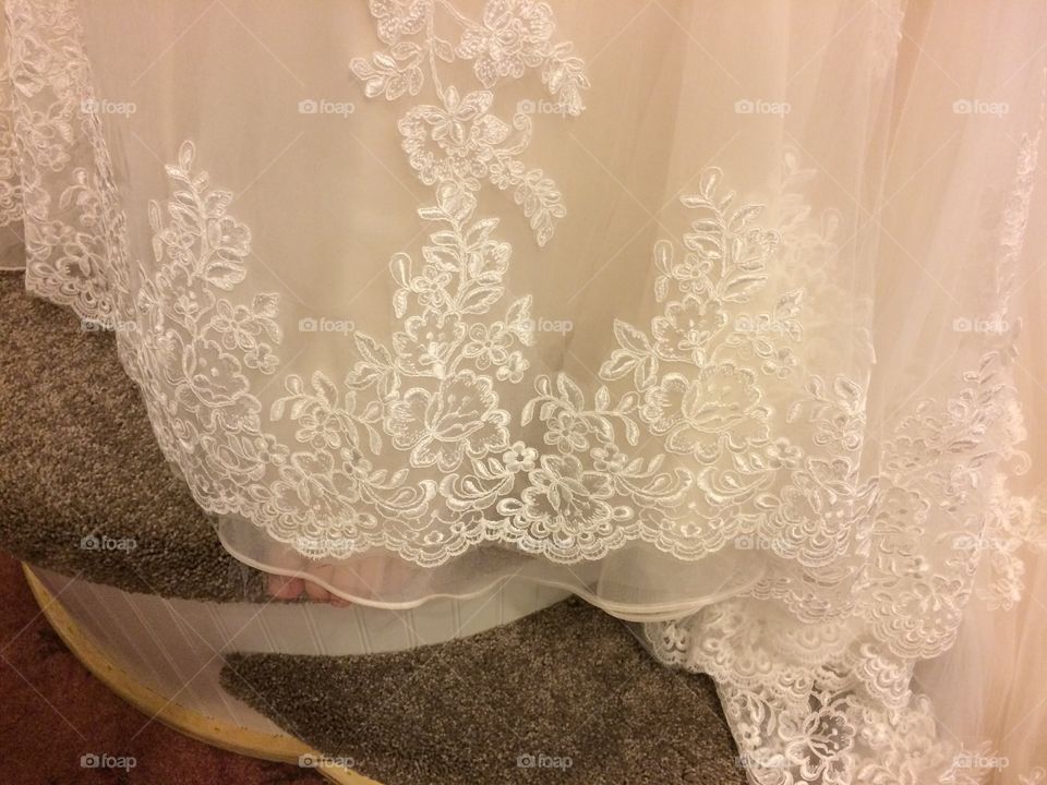 wedding dress close up lace ivory hemline