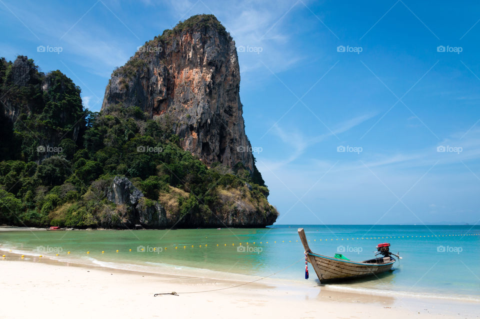 Boat moored at beach