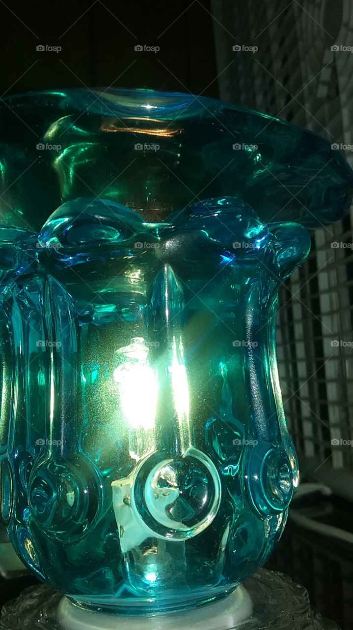 Light burning inside a glass