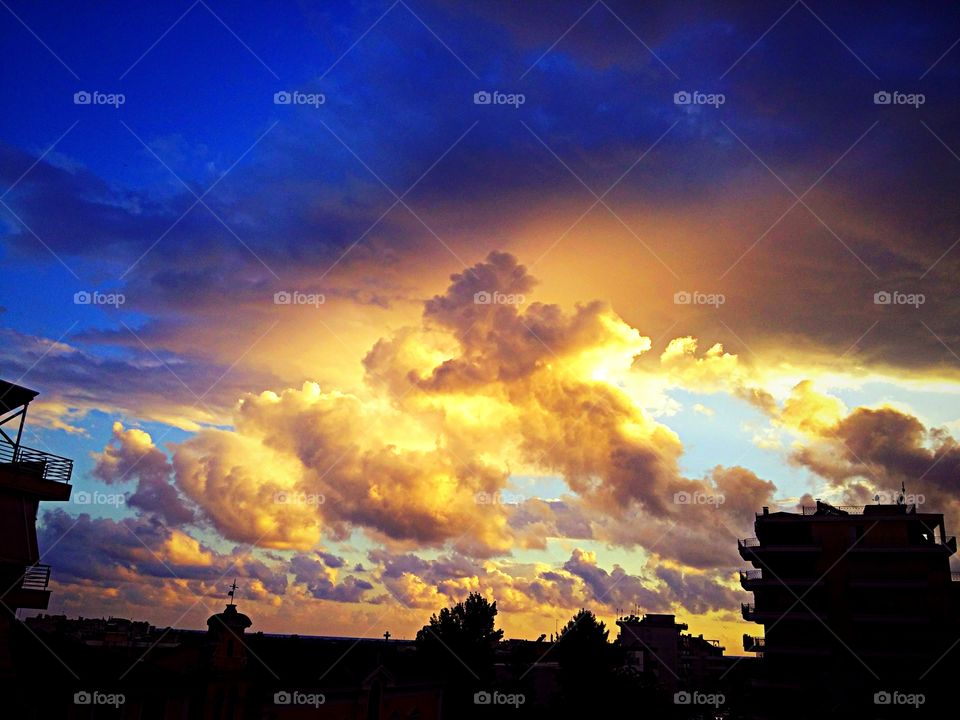 sunset sky with golden clouds