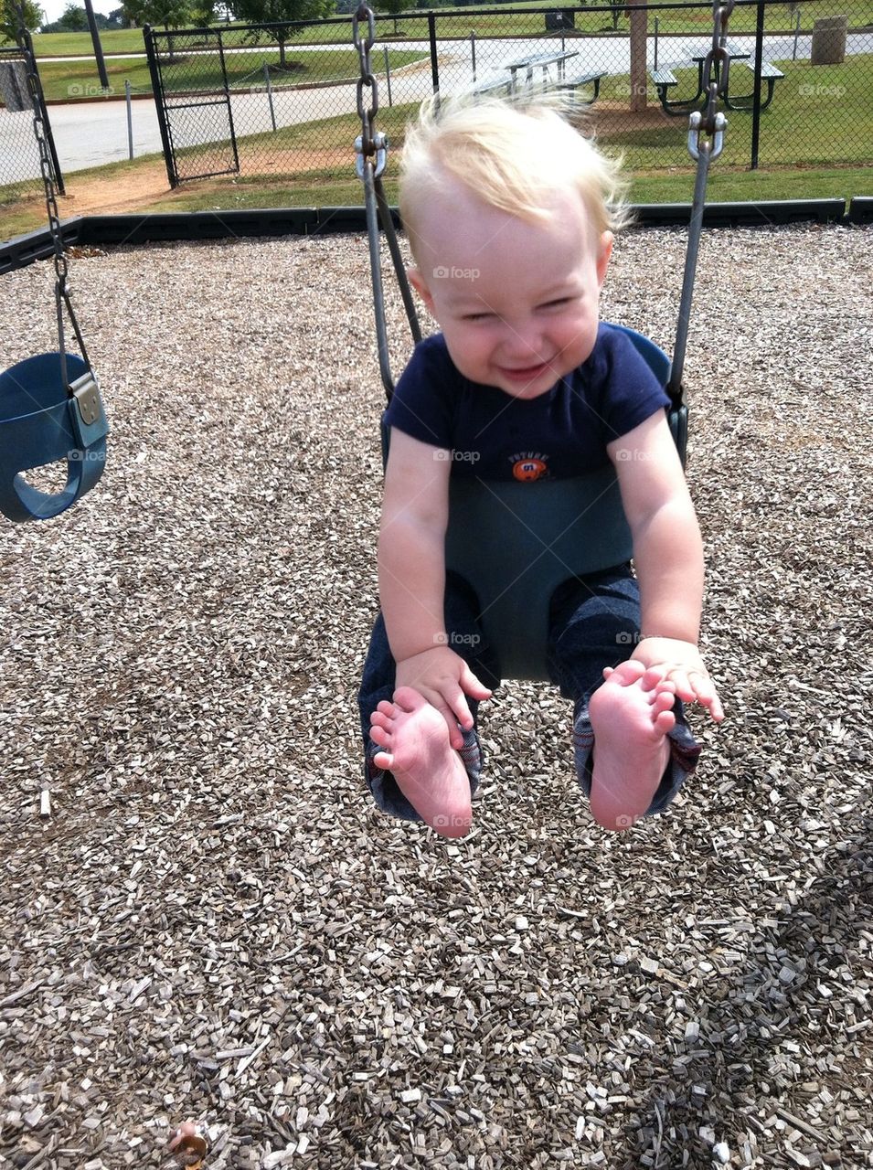 Funny baby swinging!