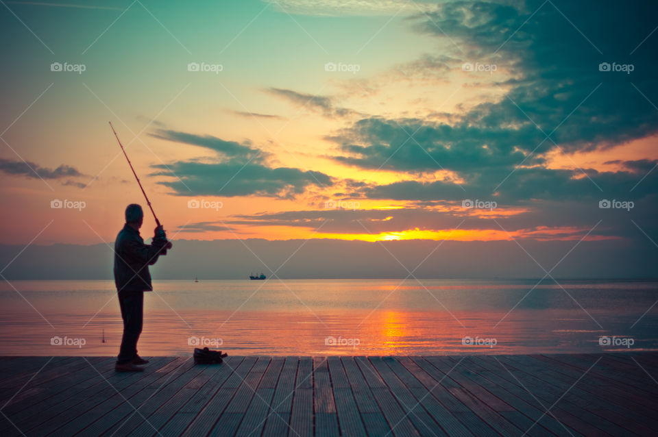 Fisherman In The Sunset
