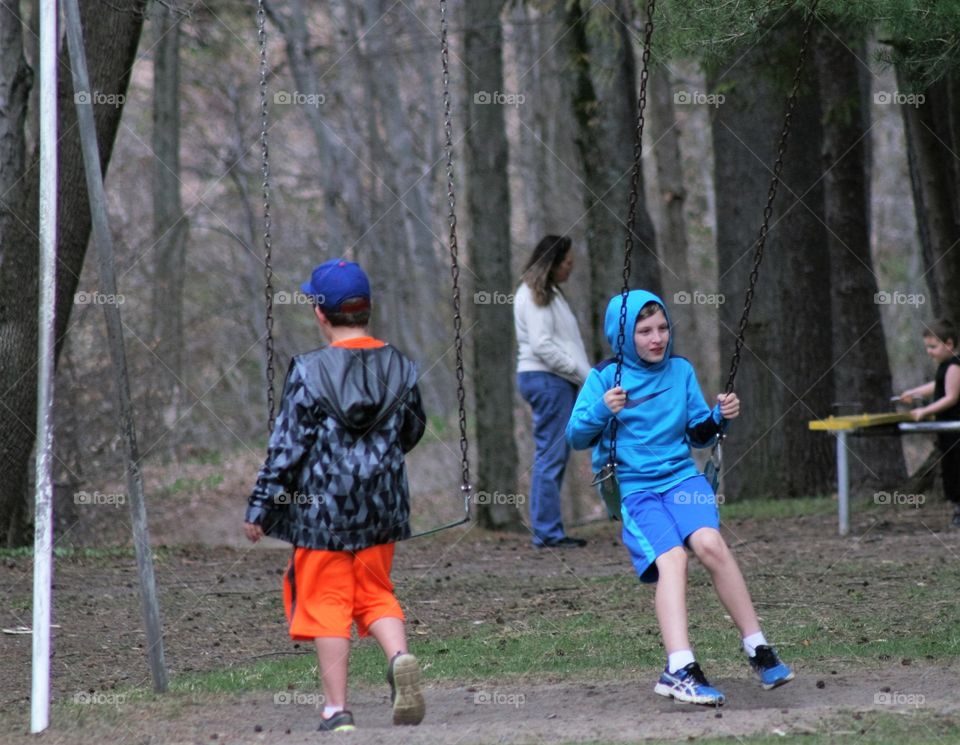 kids on swing