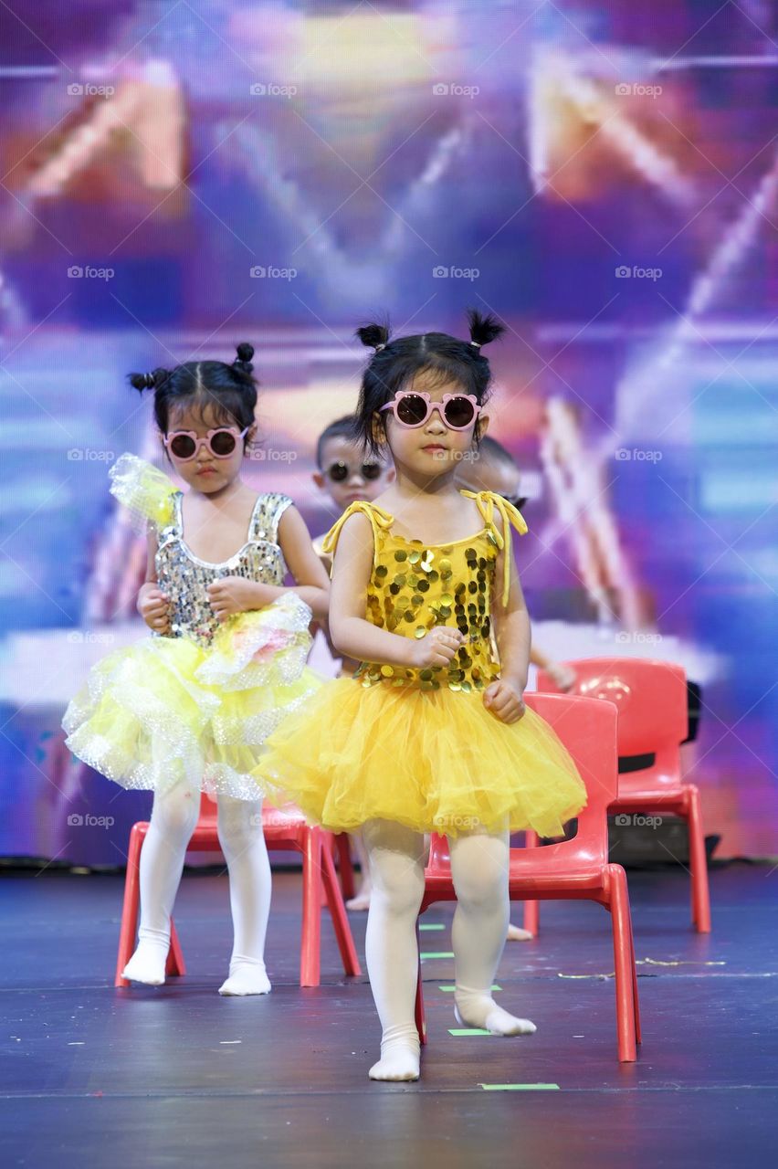 Cute little Girl Performing on the stage 