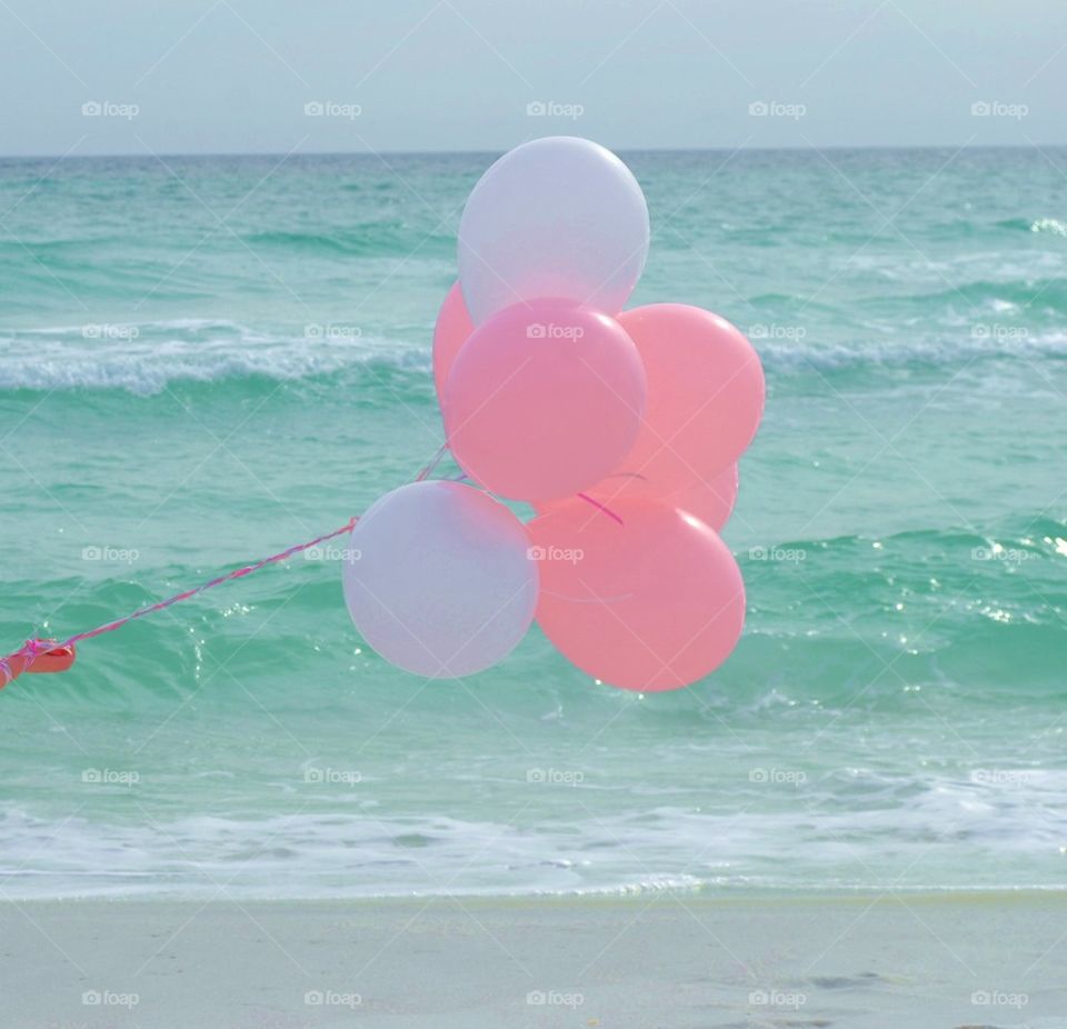 Balloons over the sea