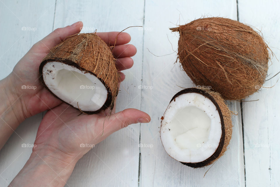 Coconut, fruit, food, hands, still life, abstraction, coconut in hands, cut coconut in hands, whole coconut, broken coconut