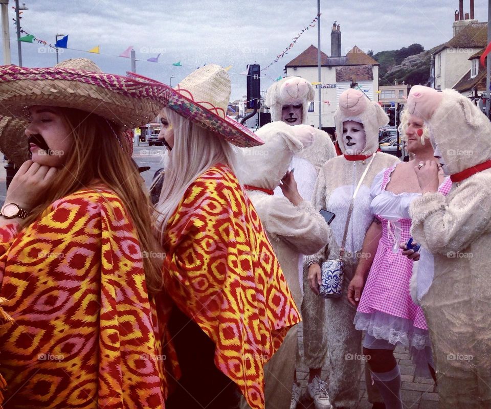 Mexicans & Sheep queuing up to take part in a fancy dress treasure trail