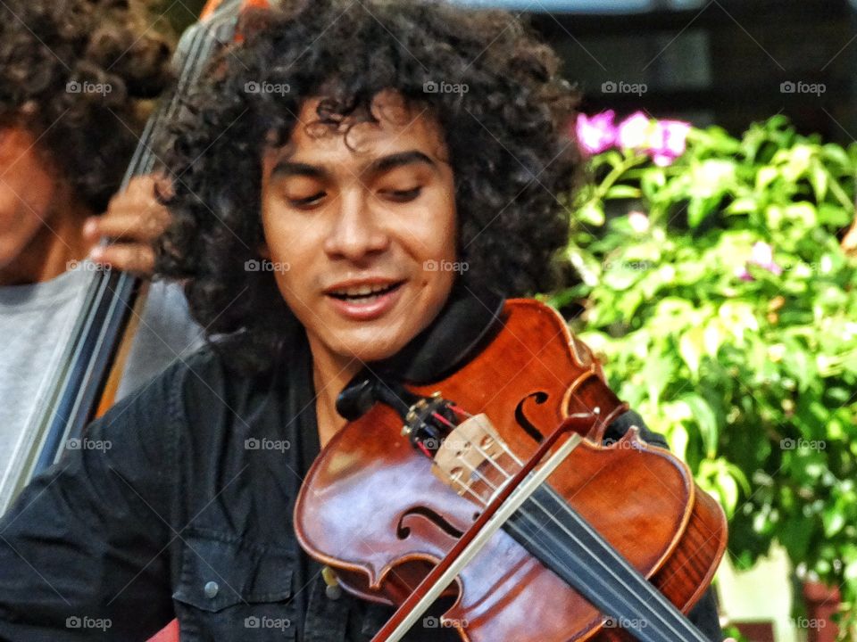 Playing The Violin. Street Musician In Mexico Playing The Violin
