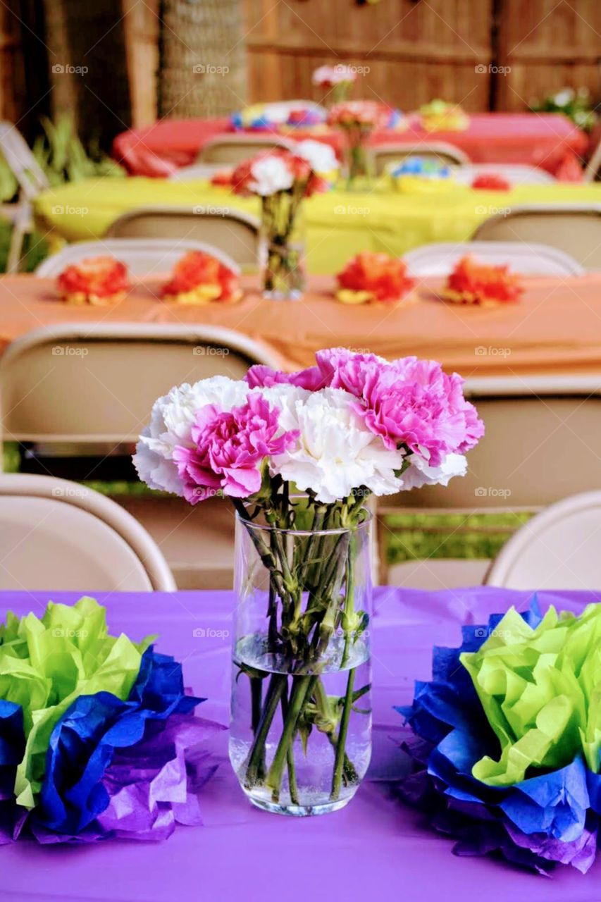 Taking time out to set an outdoor celebration for a family member lets them really know that their family really cares for them. Making it colorful and bright always puts a smile on anyone’s face who sees the set-up.
