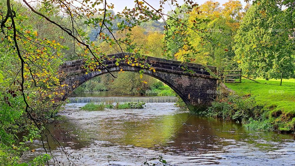 autumn shades a pretty bridge and the river tinged with autumn 🍂 🍁