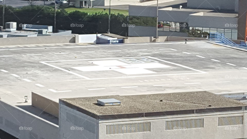 Helicopter pad.. Helicopter landing pad on parking garage.