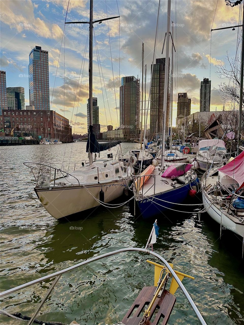 This is “Newtown Creek” by the “Pulaski Bridge” in LIC, Queens with its various boats that are tied to the shore here. The peculiar lighting this afternoon gives the “East River” an intensely unusual silvery sheen. 2024. Hypnotic Productions
