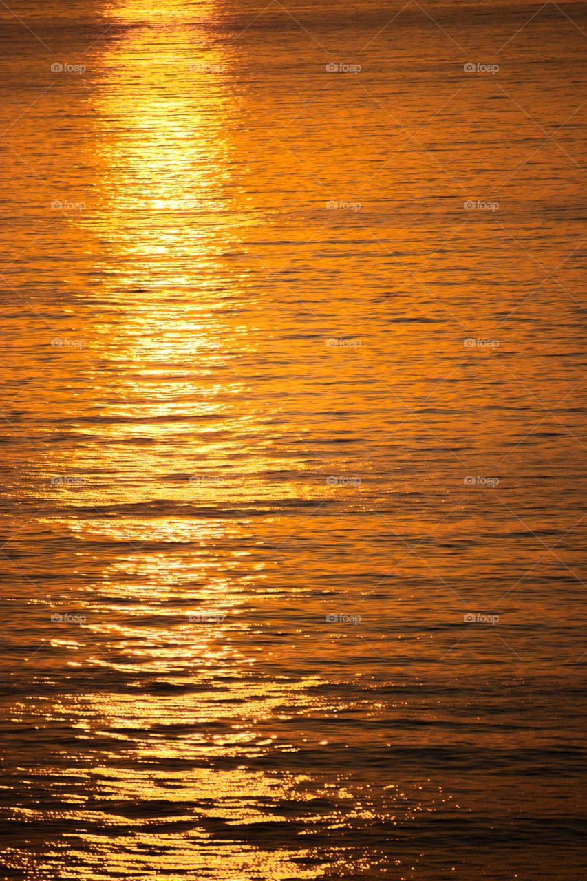 Sunset Reflections. Seeing the sea colored by vanishing sunlight is always an unforgettable experience 