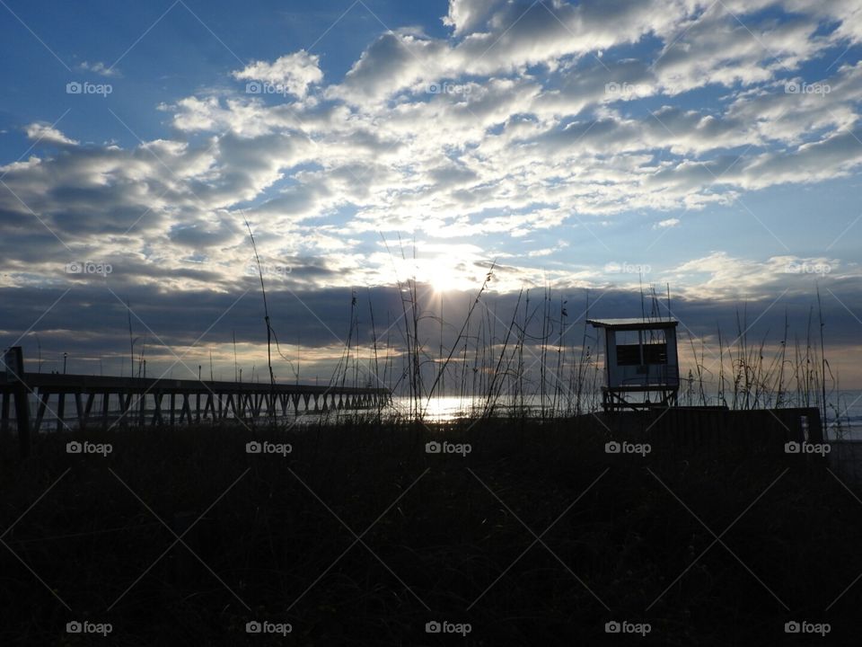 Sunlight peeking over the clouds.