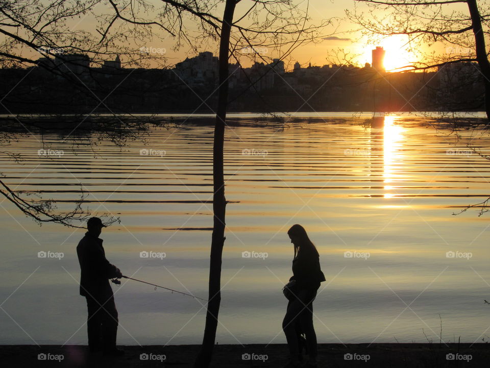 sunset over the city across the river