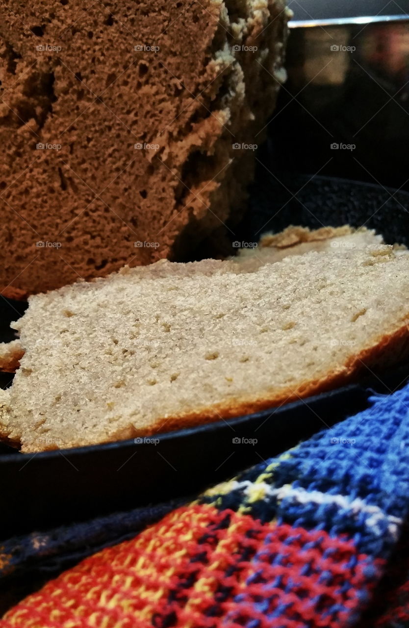 Some homebaked bread and a tea towel