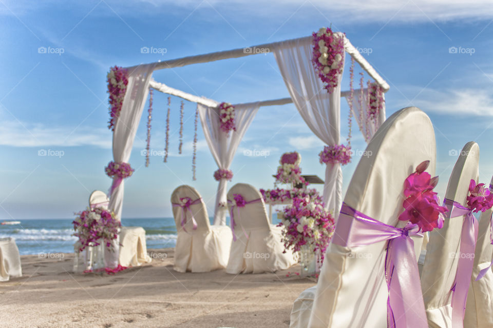 Beach wedding setting. summer sunny day for lovers