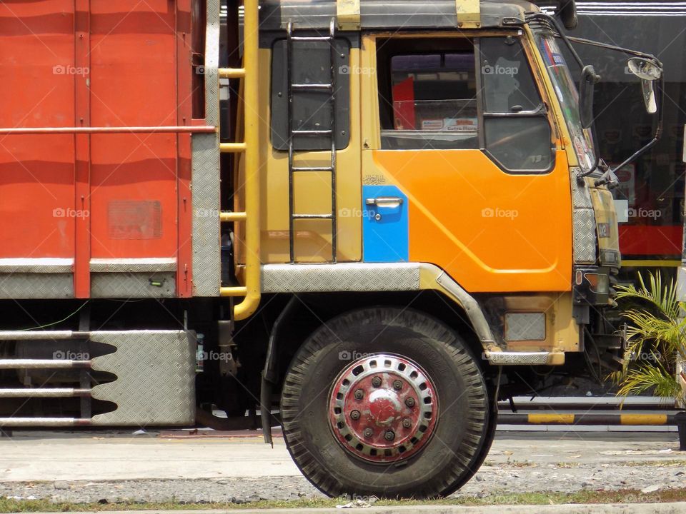 The truck is parked on the side of the road