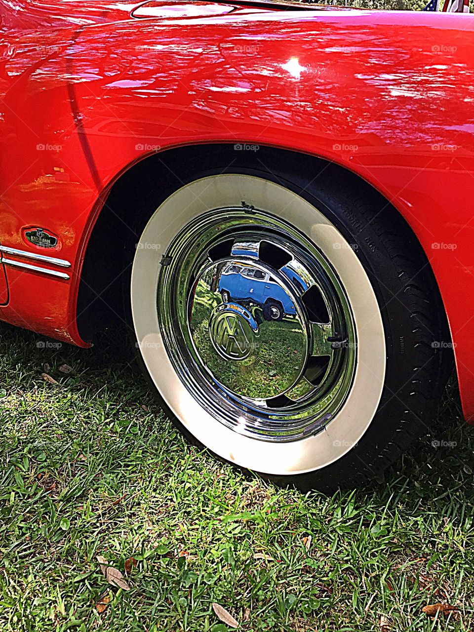 1969 Karmann Ghia Volkswagen- reflection on the chrome hub cap