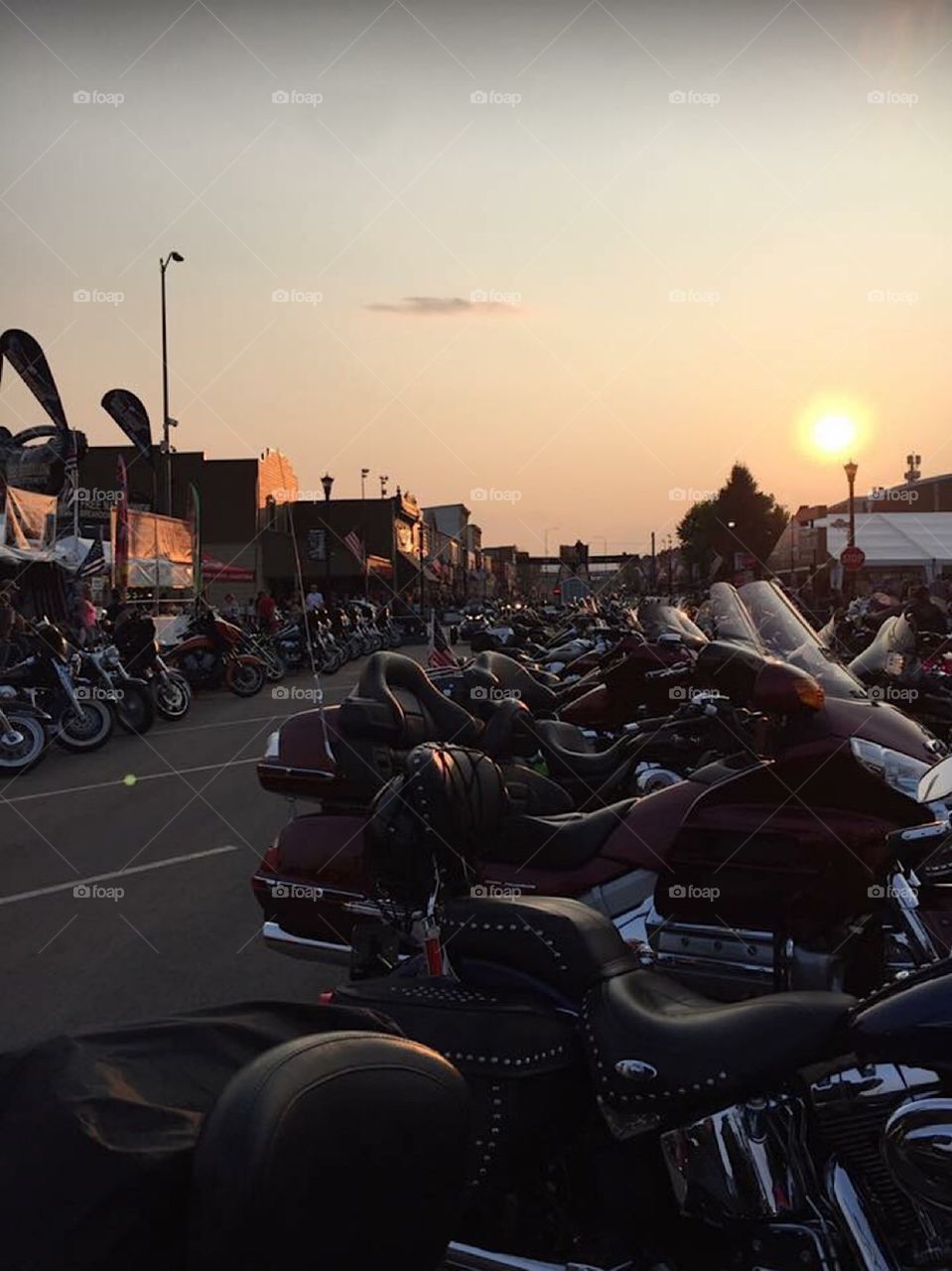 Sunsetting in downtown Sturgis South Dakota motorcycle rally motorcycles lined up parked 