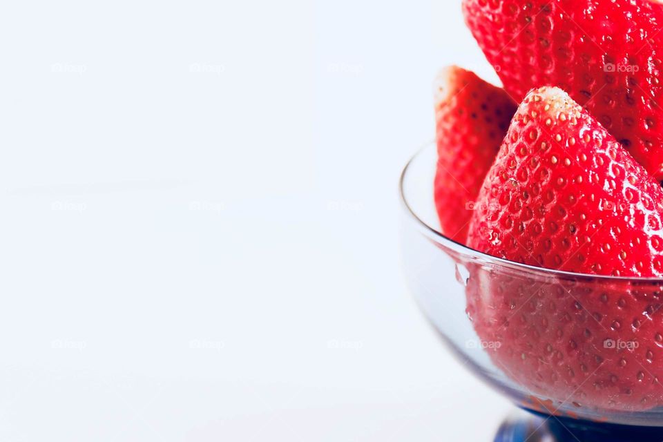 Ripe strawberries in the pot