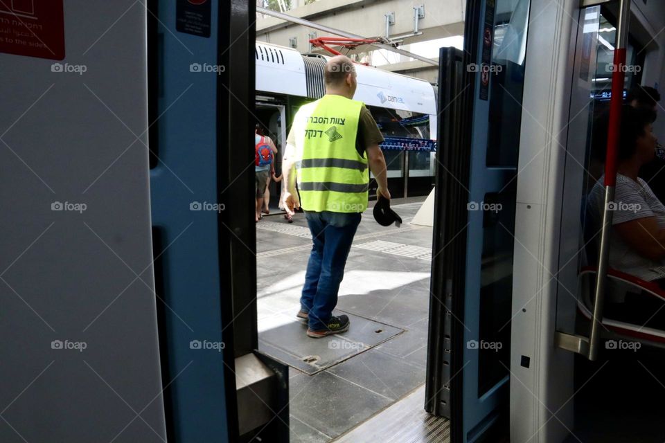Rail worker view from open rail door 
