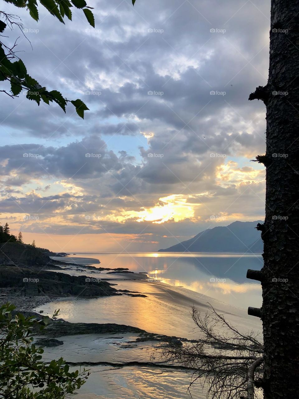 Nothing like camping with a beer and a sunset over the ocean in Hope, Alaska 