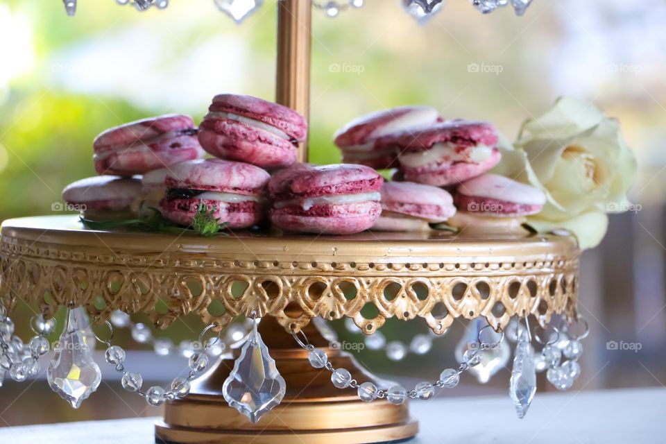 Macaroon and flower on cakestand