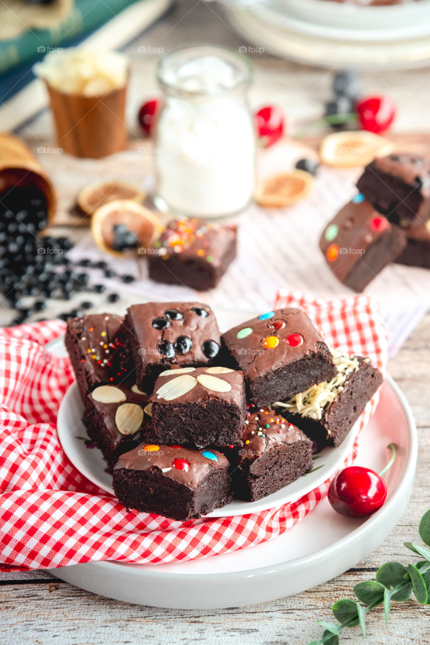 A tempting chocolate brownies, delicious and tasty, served on the table